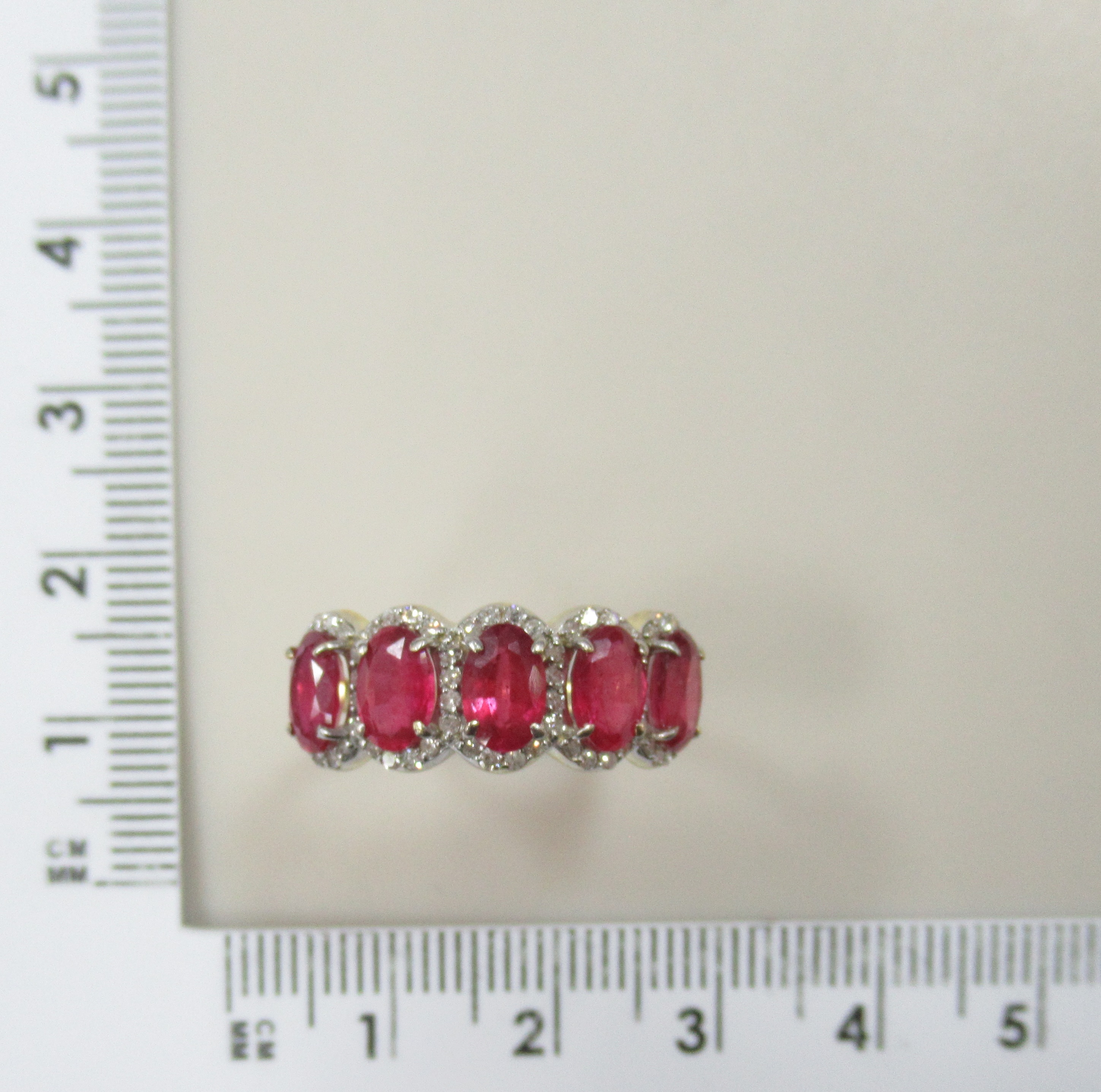 Кольцо из желтого золота с рубинами